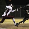 Palo Verde running back Sidney Hodge dodges Cimarron-Memorial defensive back Roderick Washington during the Sunset Regional semifinals at Palo Verde High School on Nov. 14. Hodge verbally committed to UNLV on Jan. 26.
