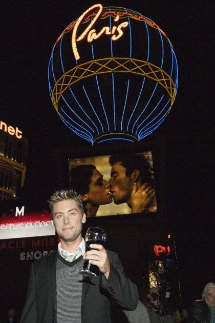Lance Bass poses in front of the Paris resort. 
