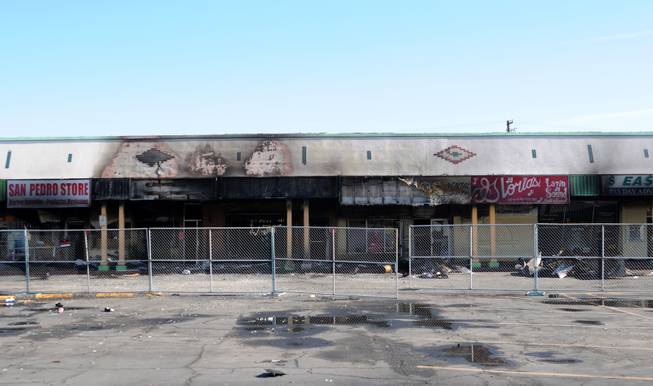 Authorities are investigating a fire that began early Friday at a shopping center in northwest Las Vegas. The blaze damaged seven businesses at the Twin Lakes Plaza Shopping Center at North Rancho Road and West Washington Avenue.

