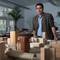 Photo: Robert Dorgan looks out over a wooden model of dow Photo: Robert Dorgan looks out over a wooden model of dow