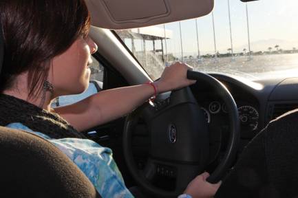 Michelle Harnik, 15, a student at Coronado High, attempts to avoid skidding during a training exercise as part of the Driver's Edge program at the Las Vegas Motor Speedway.