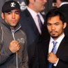 Boxers Oscar De La Hoya, left, and Manny Pacquiao pose during a news conference at the MGM Grand Wednesday, December 3, 2008. De La Hoya and Pacquiao will meet for a 12-round welterweight fight at the MGM Grand Garden Arena on Saturday. Boxers Oscar De La Hoya, left, and Manny Pacquiao pose during a news conference at the MGM Grand Wednesday, December 3, 2008. De La Hoya and Pacquiao will meet for a 12-round welterweight fight at the MGM Grand Garden Arena on Saturday.