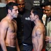 Boxers Oscar De La Hoya, left, and Manny Pacquiao of the Philippines face each other during an official weigh-in at the MGM Grand Garden Arena Friday, December 5, 2008. De La Hoya and Pacquiao will meet for a 12-round welterweight fight at the arena on Saturday. Boxers Oscar De La Hoya, left, and Manny Pacquiao of the Philippines face each other during an official weigh-in at the MGM Grand Garden Arena Friday, December 5, 2008. De La Hoya and Pacquiao will meet for a 12-round welterweight fight at the arena on Saturday.