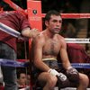 Oscar De La Hoya sits in his corner between rounds of Saturday night's welterweight fight against Manny Pacquiao at the MGM Grand Garden Arena. Oscar De La Hoya sits in his corner between rounds of Saturday night's welterweight fight against Manny Pacquiao at the MGM Grand Garden Arena.