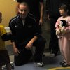 Members of the BYU and Arizona football teams visit Sunrise Children's Hospital to deliver gifts to long-term patients.  