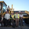 Ed Owens, left on grader, cleared the way to Anthem. Also on the machine is Clint Hall. At bottom, from left, are fellow city workers Darwin Barton, Ryan Minehan, Kurt "Sgt. Sweeper" Eckhardt, Don Nash and Ron Reed. Ed Owens, left on grader, cleared the way to Anthem. Also on the machine is Clint Hall. At bottom, from left, are fellow city workers Darwin Barton, Ryan Minehan, Kurt "Sgt. Sweeper" Eckhardt, Don Nash and Ron Reed.