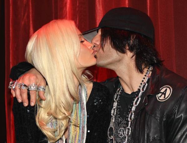 Criss Angel and Holly Madison at their joint birthday party at LAX on Dec. 19.