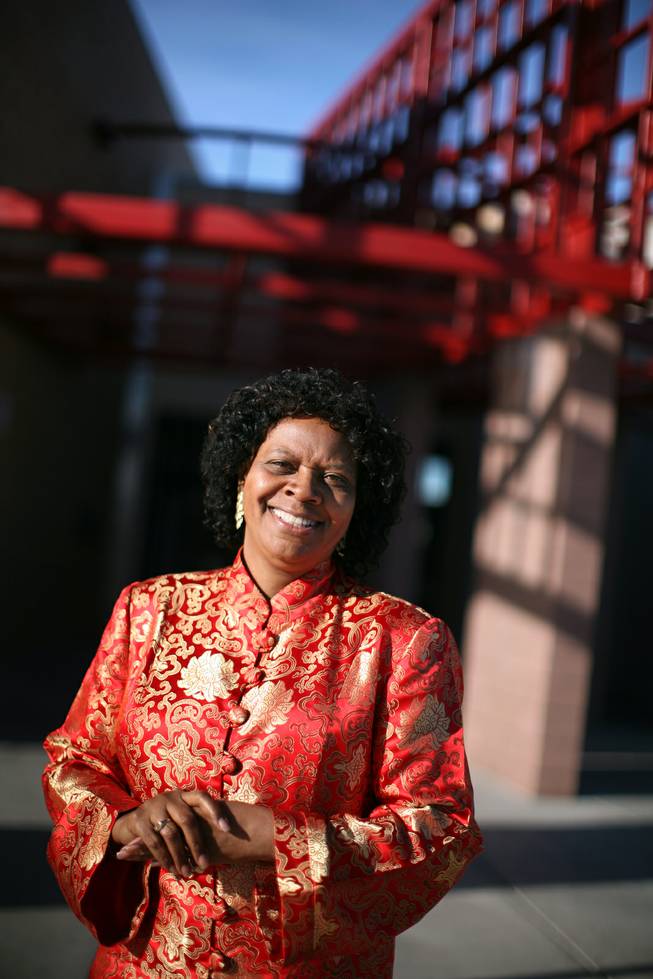 Principal Beverly Mathis in front of the school she has directed for more than a decade, Booker Elementary School in North Las Vegas. 