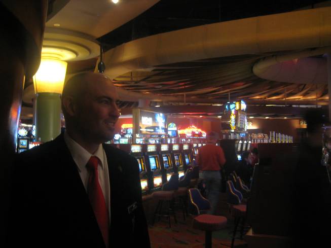 <p>7:45 p.m.: Playboy Club floor supervisor Jeff Dwyer enjoys the relative calm of the Palms casino floor before heading up to the mayhem of his work environment.</p>
<p>As floor supervisor at Playboy Club he knew he had a long night ahead of him.</p>
<p>"We have a lot of fun, a lot of special guests like to make it to Playboy Club on New Year's Eve," he said. "It gets pretty crazy around midnight."</p>
<p>As he prepared for his 8 p.m. shift, the crowds of party people he would be corralling later that night were also just getting started.</p>