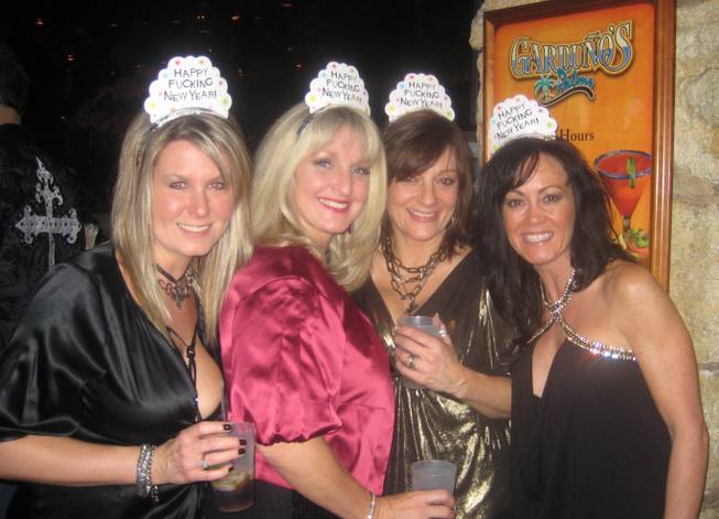 <p>8:50 p.m.: Four mothers, no children: These women left their nine kids at home and flew to Las Vegas with their husbands to ring in the new year at the Palms.</p>
<p>Cyndi Johnston, Cyndee Fiorillo, Kristine Richter and Renee Johnston (l-r) agreed that New Year's Eve is a night for adults.</p>
<p>Between the four of them they have nine children between the ages of four and 16 years old - yet none of the women appeared to be suffering from any separation anxiety as the group made their way to their table at Gardunos.</p>
<p>Instead, the women said their only regret was that a fifth friend had to stay back home in Minnesota with her four kids while her husband accompanied the others on the trip to Sin City.</p>
