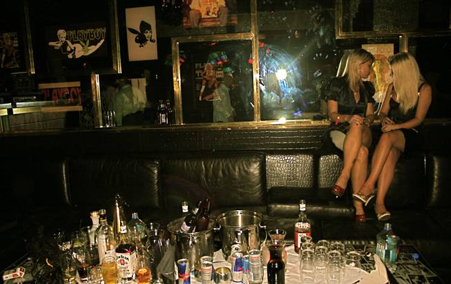 <p>2:40 a.m.: Kid Rock and his entourage left a wake of mostly-empty bottles and a pair of pretty blondes after the Detroit rocker left the New Year's Eve party at Playboy Club.</p>
<p>The rock n' roll cowboy attracted quite the crowd as the venue filled with revelers who paid upward of $200 apiece to party with him.</p>
<p>Once he entered the bunny-branded nightspot fans jostled for position in front of his VIP booth and struggled to catch a glimpse of the star as he celebrated 2009 with a group of friends that included Palms owner George Maloof.</p>
<p>The crowd didn't clear until after Rock left the club around 2:30 a.m.</p>