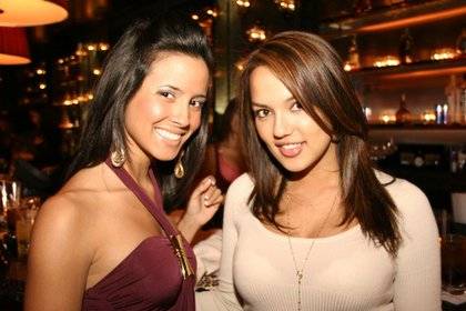 Playboy Playmate Raquel Gibson and friend.