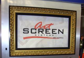 The Art Screen is hiding a television, believe it or not.