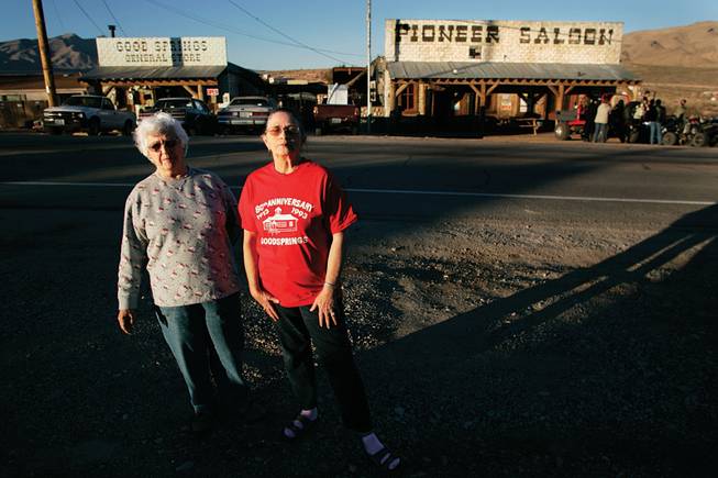 
Goodsprings residents Liz Warren, left, and Ruth Rawlinson stand across from the historic Pioneer Saloon, whose expansion they oppose, they say, for fear of the kind of clientele a hotel might attract. "We are plagued with revving motors through town all hours of the day and night," Rawlinson said.