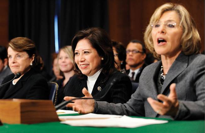 
Labor secretary-designate Rep. Hilda Solis, center, is introduced Friday to the Senate Health, Education, Labor and Pension Committee by Democratic Sen. Barbara Boxer of California.
