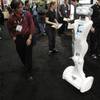 Photo: The Anybots QA teleconferencing robot gives users Photo: The Anybots QA teleconferencing robot gives users