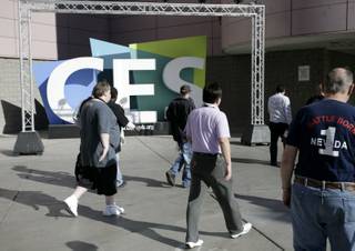 Show attendees file into the Las Vegas Convention Center in this 2009 file photo.