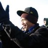 
College of Southern Nevada student Jashaun Kisling watches the inauguration ceremony Tuesday from the National Mall in Washington, D.C. The 18-year-old film major says President Barack Obama has inspired in him an interest in politics where none had been before. 