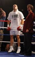 Undefeated cruiserweight boxer BJ Flores of Las Vegas jumps in his corner before his fight Friday with Matt Hicks at the Plaza in downtown Las Vegas.