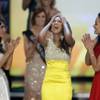 Miss Virginia Caressa Cameron, center, reacts after being named Miss America at the 2010 Miss America Pageant at Planet Hollywood. With Cameron are Miss New Mexico Nicole Miner, left, and Miss Hawaii Raeceen Anuenue Woolford.