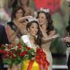 Miss Virginia Caressa Cameron reacts as she is crowned Miss America by 2009 Miss America Katie Stam during the 2010 Miss America Pageant at Planet Hollywood on Jan. 30, 2009. Host Mario Lopez, left, and special correspondent Clinton Kelly look on.