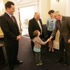 Connor Lindoff meets Gov. Jim Gibbons while accompanying, from left, John Oceguera, D-Las Vegas, Bernie Anderson, D-Reno, and Heidi Gansert, R-Reno, on the first day of the 2009 legislative session. Gibbons asked Connor, who is Anderson's grandson, if he was ready to get to work. "I already am," Connor replied. "I'm in kindergarten."