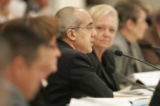 Assemblyman Mo Denis, D-Las Vegas, asks a question during a meeting of the Interim Finance Committee in Carson City Tuesday, Feb. 3, 2009. 