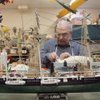 With a finished model boat on display in front of him, Bob Sylvester, a member of the Sun City Summerlin Model Builders' Club, works on a new project at Desert Vista Community Center. With a finished model boat on display in front of him, Bob Sylvester, a member of the Sun City Summerlin Model Builders' Club, works on a new project at Desert Vista Community Center.