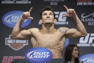 Ronys Torres poses on the scale during an official weigh-in for UFC 109 at the Mandalay Bay Events Center Friday, February 5, 2010. STEVE MARCUS / LAS VEGAS SUN