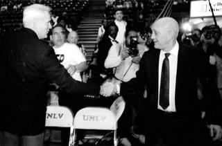Jerry Tarkanian shakes hands during Tark's final game as coach of the Runnin Rebels. Tarkanian was forced to resign from UNLV in 1992. 