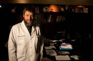 Dr. Michael Modic, chairman of the Cleveland Clinic neurological institute, poses in his office at the Cleveland Clinic on Monday, Feb. 2, 2009. 