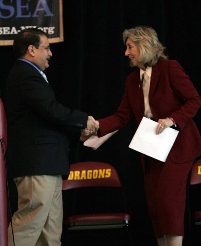 Ruben Murillo, president of the Clark County Education Association, introduces Rep. Dina Titus at an education rally Thursday at Del Sol High School.
