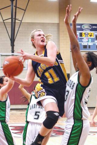 Boulder City forward Caiti Forrester leaps for the basket during the girls 3A regional championship against Virgin Valley at Desert Oasis High School on Saturday.
