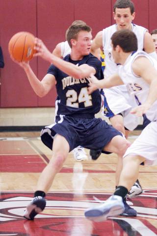Boulder City center Shane Levin finds an open player during the boys 3A Southern Regional Championship game against Moapa Valley at Desert Oasis High School on Saturday.

