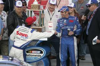 Greg Biffle gets congratulated by teammate Carl Edwards after holding him off at the end of the Nationwide Series Sam's Town 300 Saturday, February 28, 2009 at Las Vegas Motor Speedway.