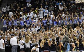 Fans of the Centennial Bulldogs show their spirit during the girls' state championship at the Orleans Arena on Friday night.