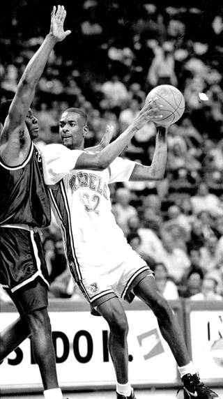 UNLV's Stacey Augmon looks for an opening to drive to the basket. 