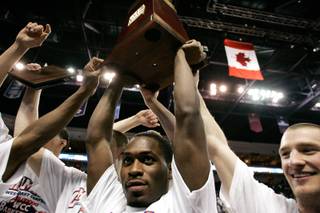 Jeremy Pargo, center, and the Gonzaga University men's basketball team celebrate their 83-58 win over Saint Mary's College in the 2009 WCC Men's Basketball Finals at the Orleans Arena in Las Vegas. Because of the WCC's success in Las Vegas, the WAC will also hold its conference tournament here starting in 2011. 
