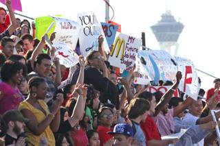 Students and advocates voice opinions on budget cuts during the Nevadans for Quality Education rally Monday at Valley High School.