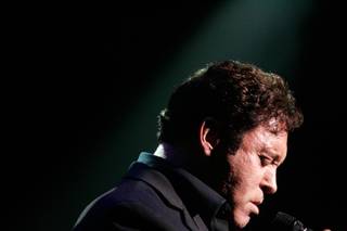 Singer, impressionist and comedian Danny Gans, shown performing at the Encore Theatre on March 20, died suddenly Friday at his home in Henderson.