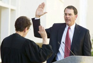 UNLV law professor Jay S. Bybee, shown during his October 2003 swearing-in as a judge on the U.S. Court of Appeals for the Ninth Circuit, is awaiting the results of a Justice Department investigation into whether his opinions on torture are consistent with standards of professional conduct.