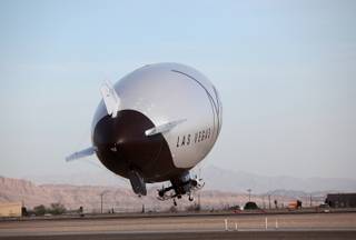 The M Lightship takes off from the North Las Vegas Airport.  The blimp has circled the Las Vegas Valley to advertise for the new M Resort on its 70-foot-by-30-foot video screen.