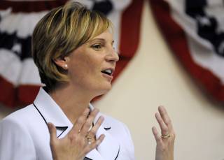 Henderson Mayoral candidate Amanda Cyphers responds to a question Thursday during a forum on minority issues at the Henderson Convention Center.