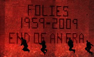 Performers dance during the final performance of Folies Bergere at the Tiffany Theatre inside the Tropicana in Las Vegas Saturday.