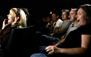The audience reacts during the adult production 
