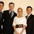 Jersey Boys cast members Jason Martinez, Erich Bergen, Travis Cloer and Deven May flank Carrie Underwood.