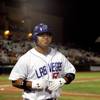 Photo: Randy Ruiz walks back to the dugout after hitting Photo: Randy Ruiz walks back to the dugout after hitting