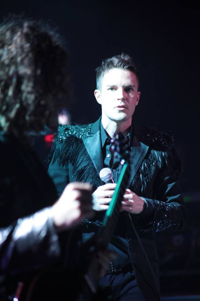 A clad-in-black Brandon Flowers.