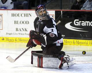 Wranglers netminder John DeCaro looks behind him as a Mark Derlago slapshot gets past him just 11 seconds into overtime to give Bakersfield a 4-3 victory over Las Vegas on Saturday night inside Rabobank Arena. Game six will be played on Tuesday night at the Orleans Arena.