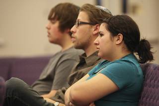 From right, Tal Mizrachi, 17, Kevin Spoor, 27, and Jonathan Eisen, 15, learn of the serious effects of bullying through the use of e-mail, cell phone texting, Web sites and social networking sites during a lecture on given by Deborah Ruiz of the Anti-Defamation League Wednesday at Midbar Kodesh Temple.